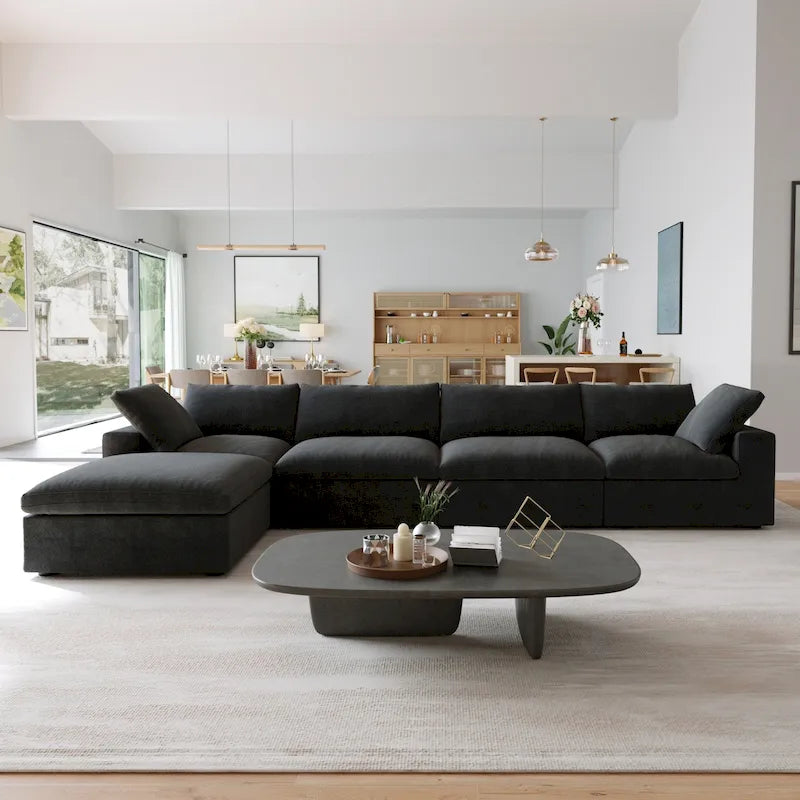 Canapé d'angle surdimensionné en duvet noir avec pouf