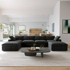 Canapé d'angle surdimensionné en duvet noir avec pouf