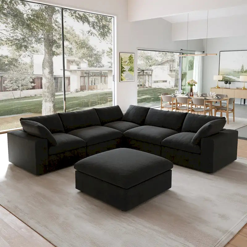 Canapé d'angle surdimensionné en duvet noir avec pouf