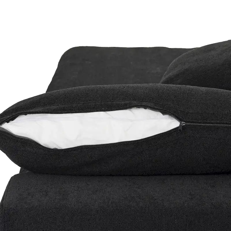 Canapé d'angle surdimensionné en duvet noir avec pouf