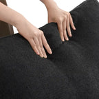 Canapé d'angle surdimensionné en duvet noir avec pouf